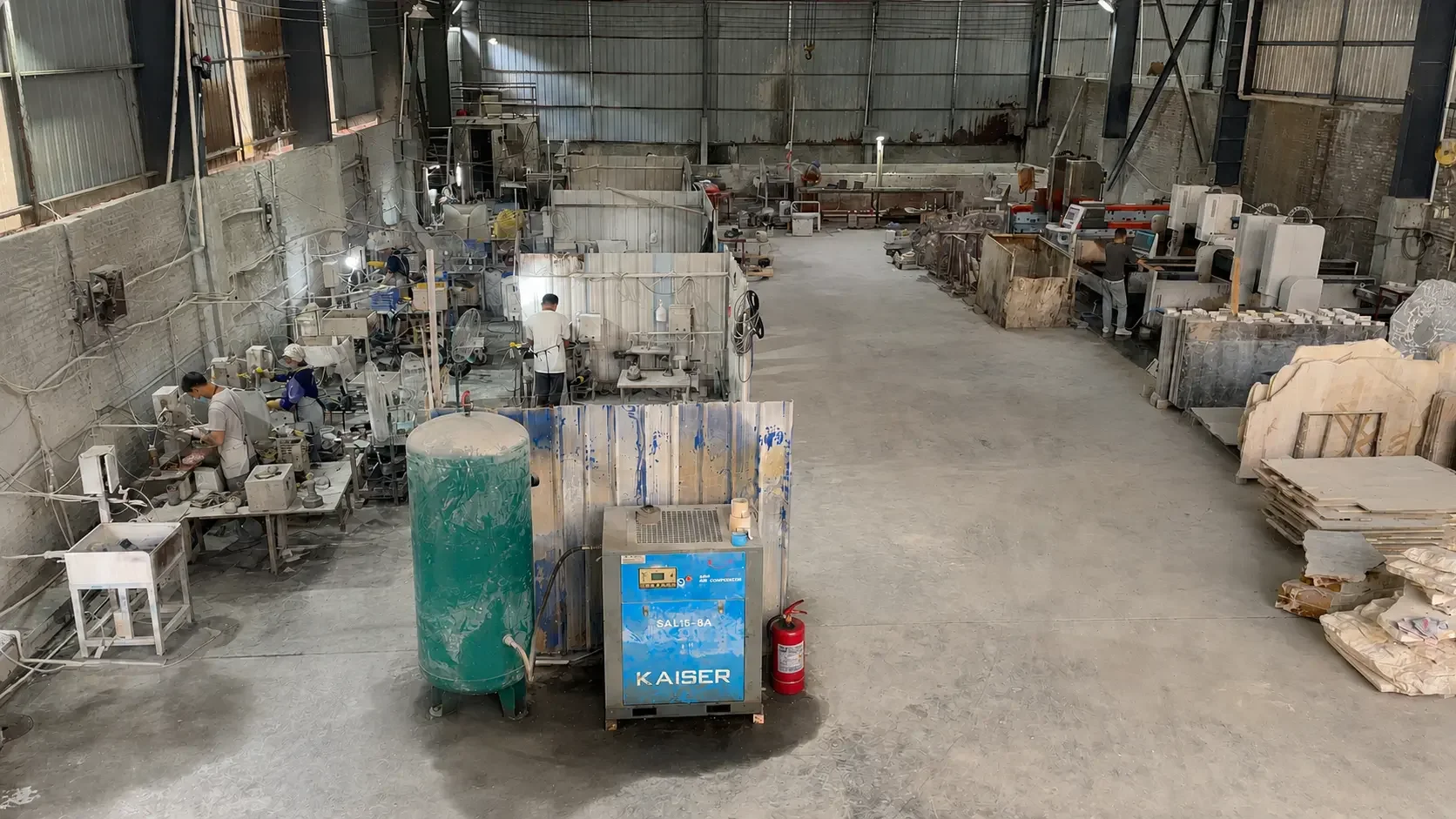 Wide view of Yunfu stone home decor production floor with CNC, finishing and workstations